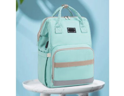 Open view of a diaper bag revealing its spacious interior and organized pockets