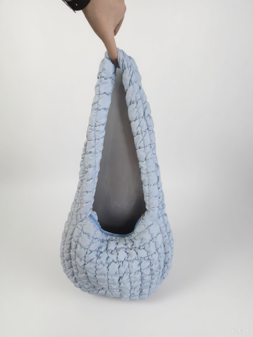 Interior of soft shoulder bag with multiple compartments