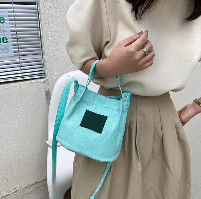 Durable material handle bag for enterprise gift use
