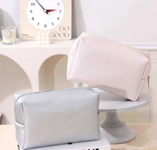 Blue cosmetic bag with zipper closure