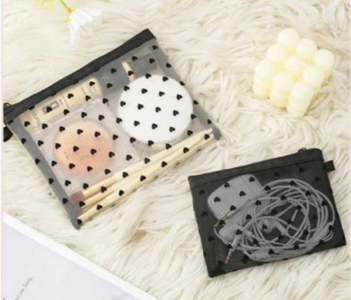 Stylish cosmetic bag in pink color