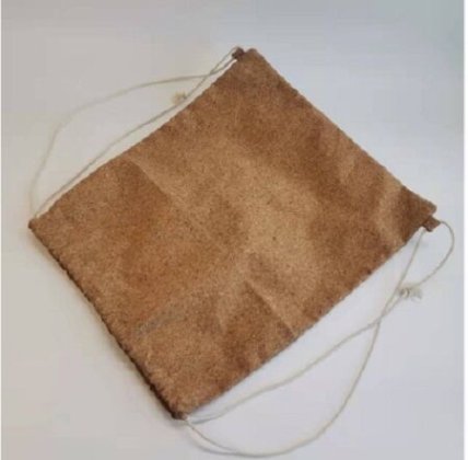 Drawstring gift bag filled with promotional products