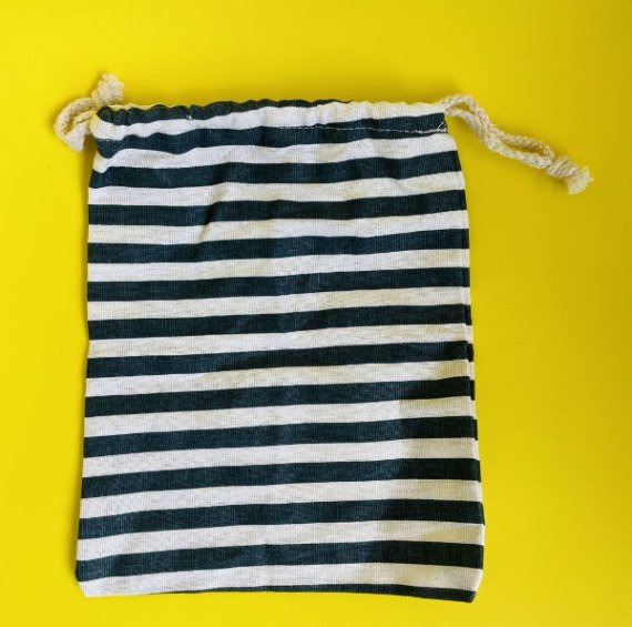 Promotional drawstring bag with brand logo for corporate gifts