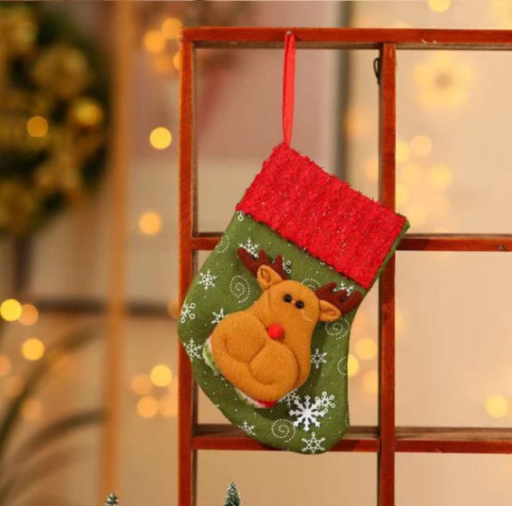 Green-trimmed Christmas stocking hanging
