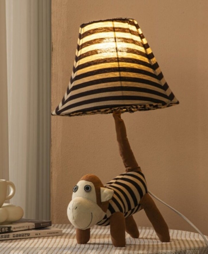 Creative children's table lamp with adjustable light