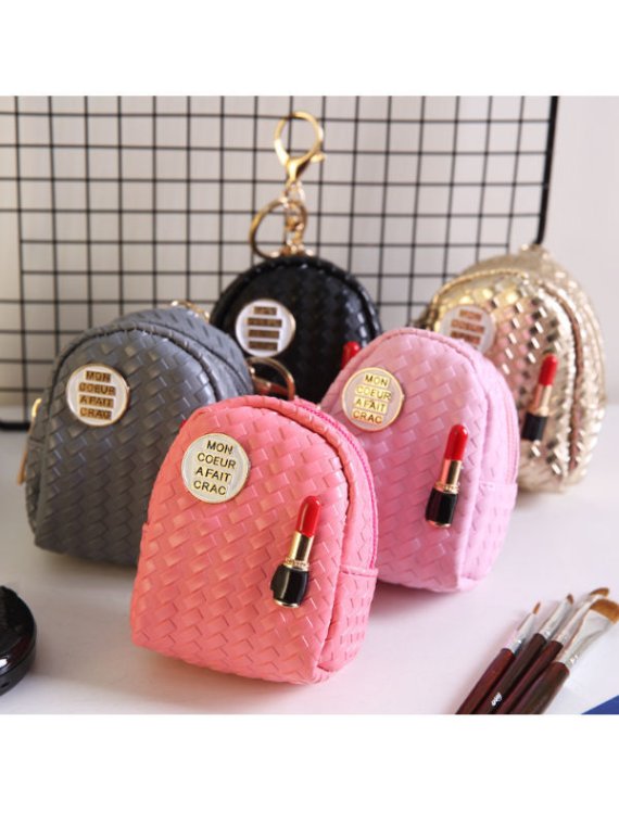 Kids' lamp coin purses on shelf
